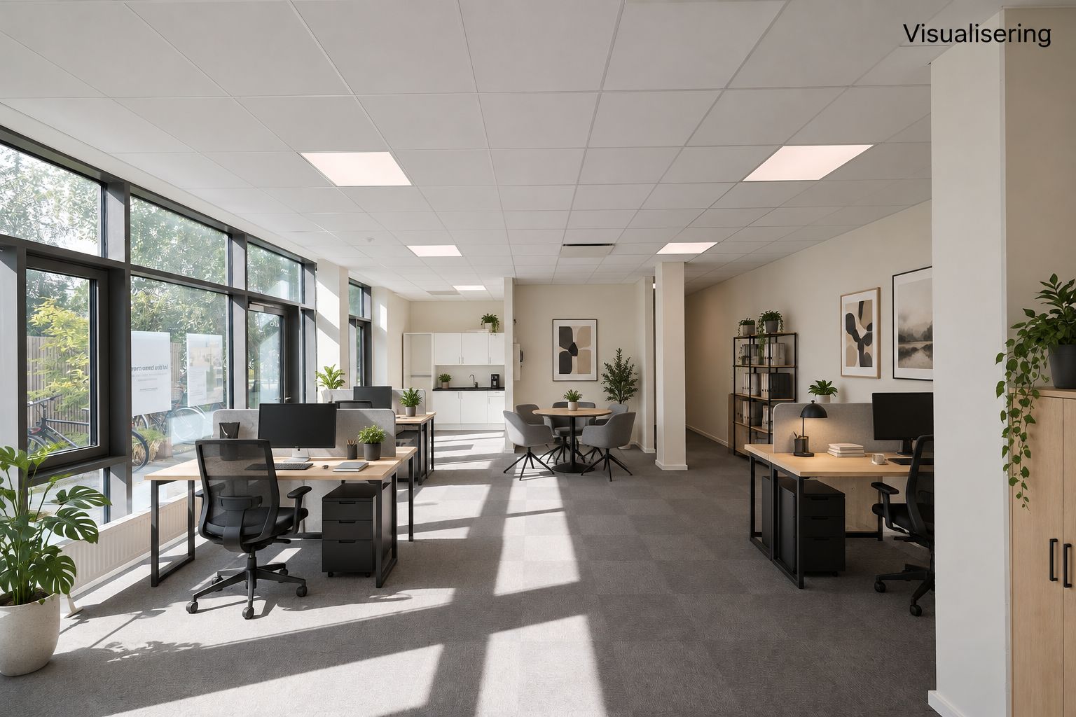 Et moderne og pænt kontor med lys, højloft og smukke møbler og indretning.