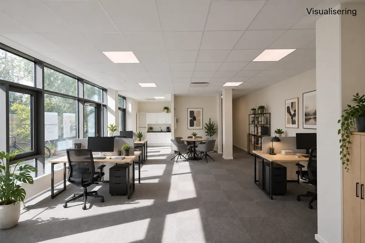 Et moderne og pænt kontor med lys, højloft og smukke møbler og indretning.