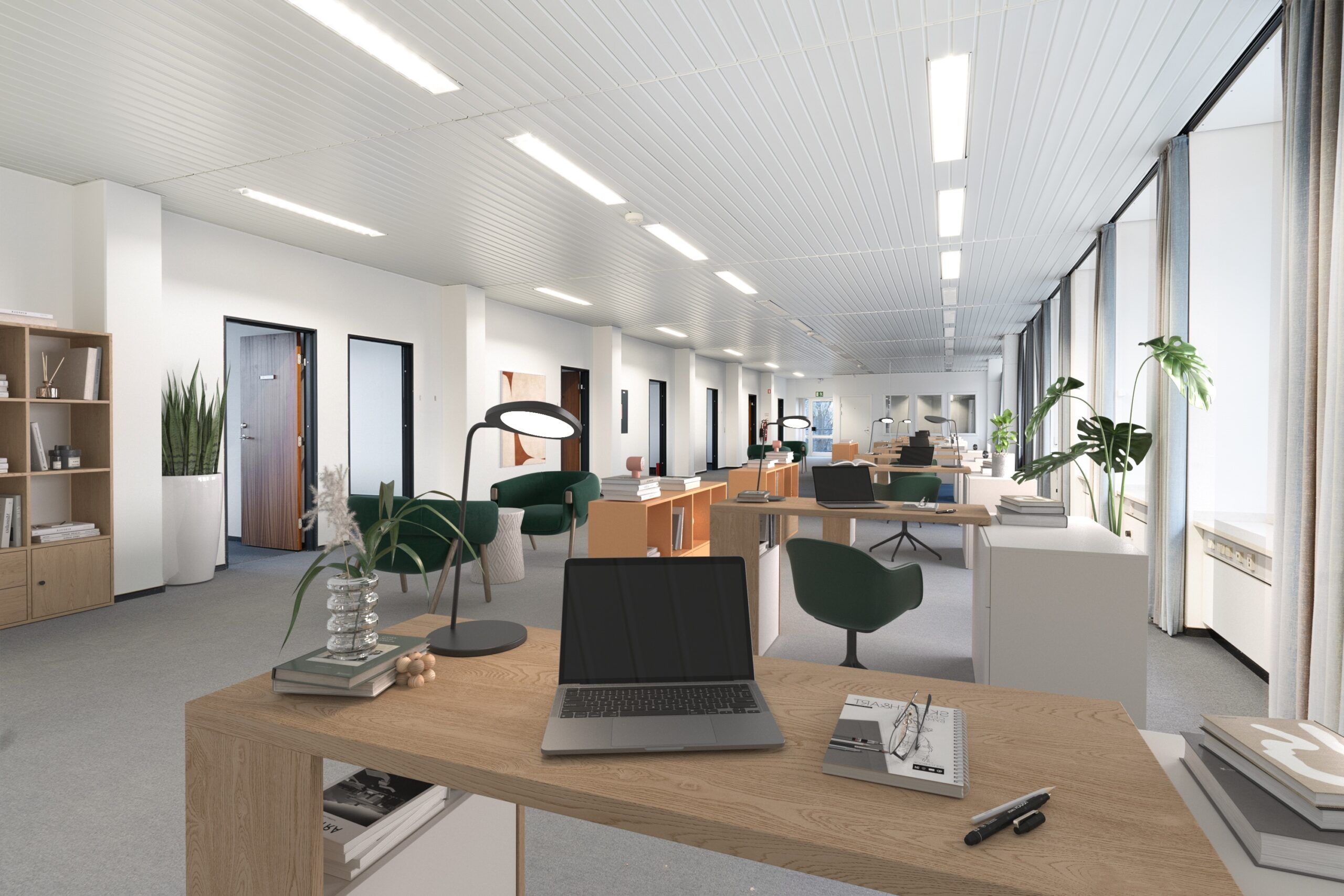 Lukket kontor med moderne indretning, højloftede lokaler, lyse gulve og smukke grønne planter samt moderne skriveborde med